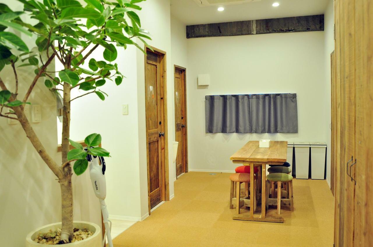 Guesthouse Akicafe Inn Hiroshima Bagian luar foto